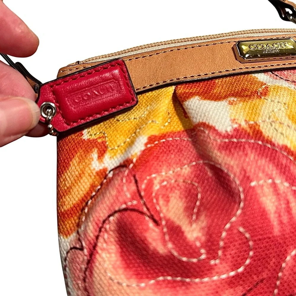 Coach Leather Fabric Floral Wristlet bag Zip close Satin lined